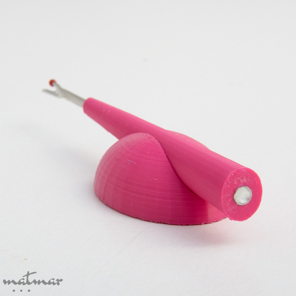 Nööpaugu lahtilõikaja Harutuspulk